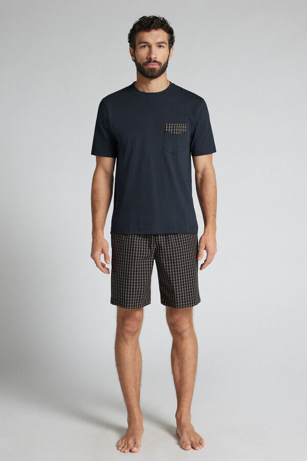 Blauer und cremefarbener Pyjama aus Stoff und Baumwolle mit Karomuster Blauer und cremefarbener Pyjama aus Stoff und Baumwolle mit Karomuster