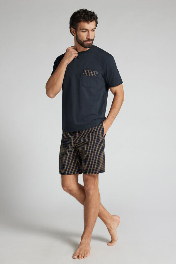 Blauer und cremefarbener Pyjama aus Stoff und Baumwolle mit Karomuster Blauer und cremefarbener Pyjama aus Stoff und Baumwolle mit Karomuster